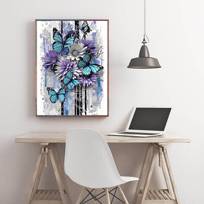 Diamond Painting-Blütenzauber mit blauen Schmetterlingen